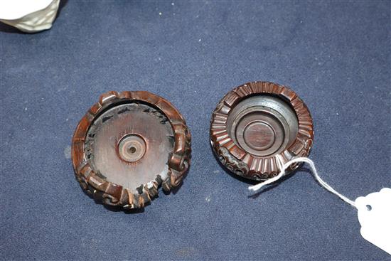 A pair of 18th century Chinese blanc de chine libation cups, wood stands